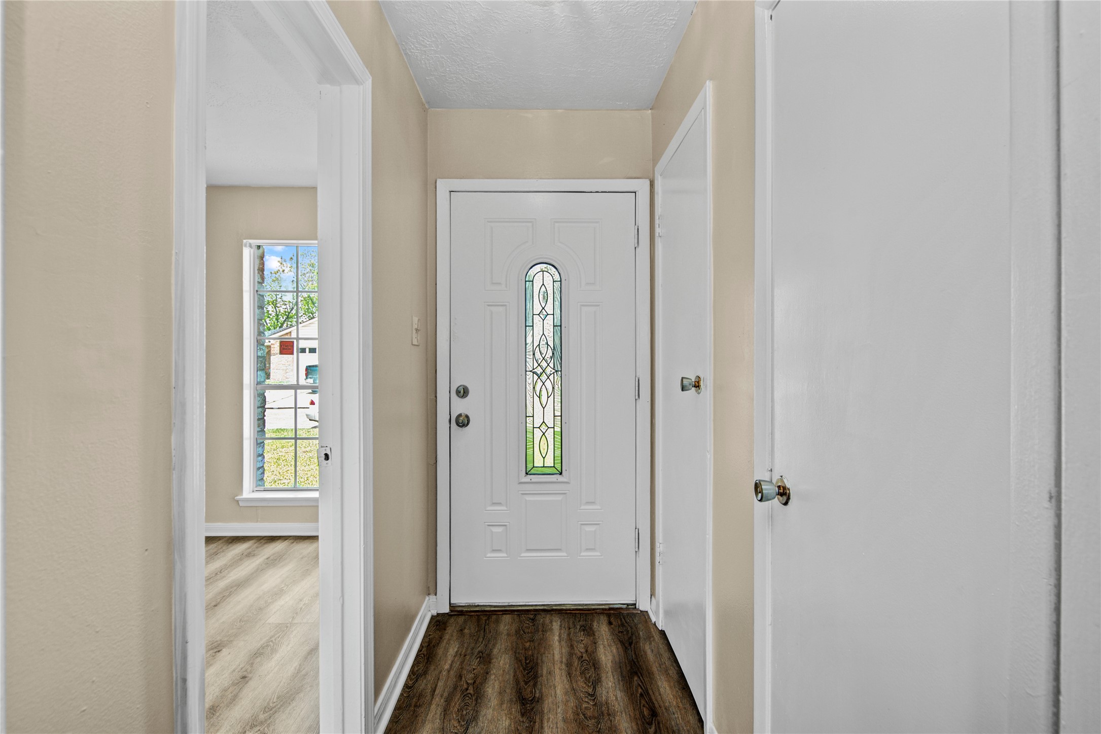 1230 Epsilon Street Pasadena, TX 77504 - Photo 5 of 27 a view of an entryway with wooden floor