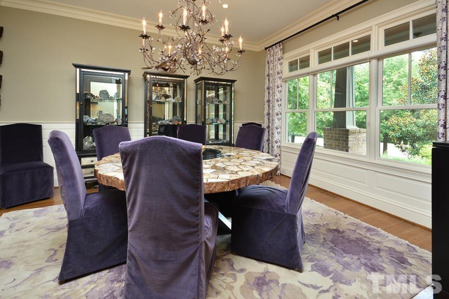 7 Springhouse Place Durham, NC 27705 - Photo 17 of 30 a view of a dining room with furniture window and wooden floor
