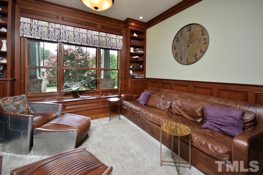 7 Springhouse Place Durham, NC 27705 - Photo 18 of 30 a living room with furniture and a large window