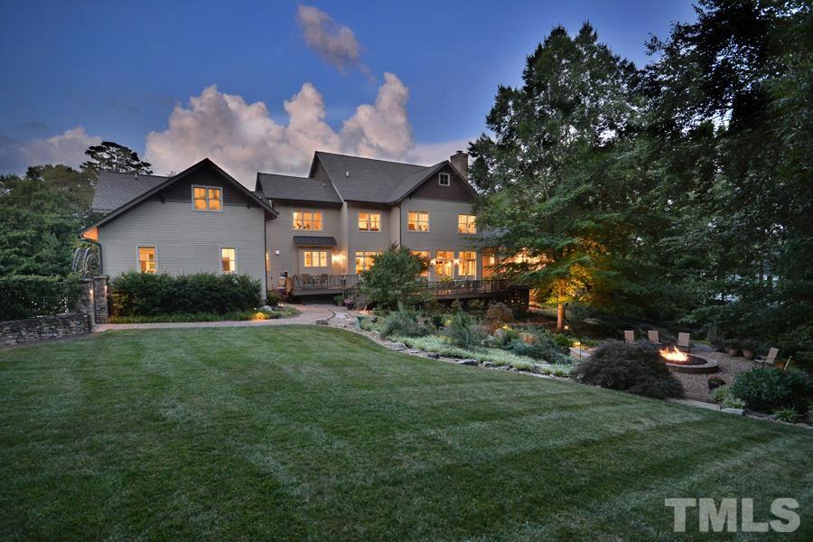 7 Springhouse Place Durham, NC 27705 - Photo 3 of 30 a front view of a house with a yard and a tree