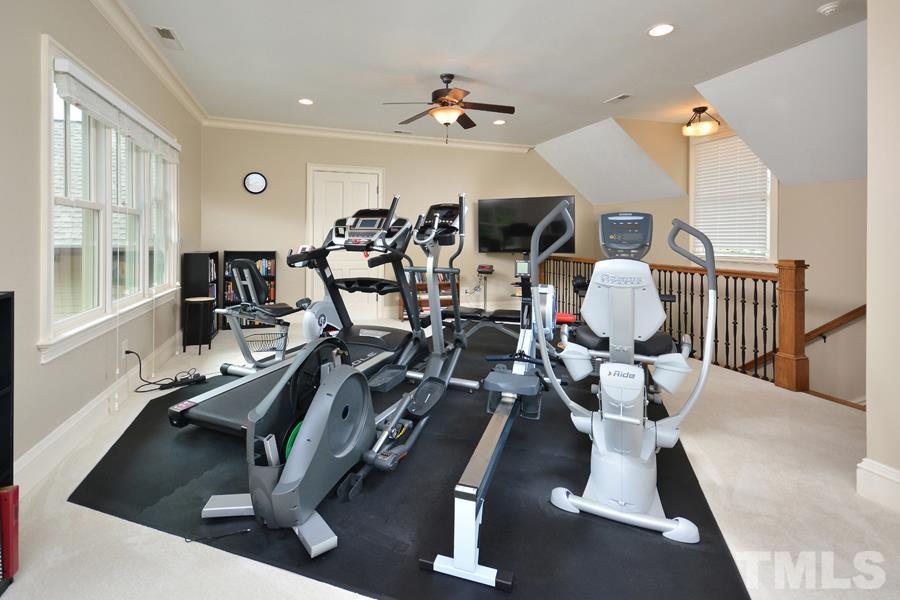 7 Springhouse Place Durham, NC 27705 - Photo 28 of 30 a view of a room with gym equipment