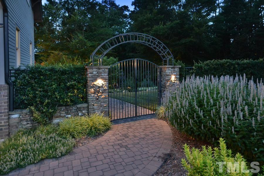 7 Springhouse Place Durham, NC 27705 - Photo 4 of 30 a garden view with a garden