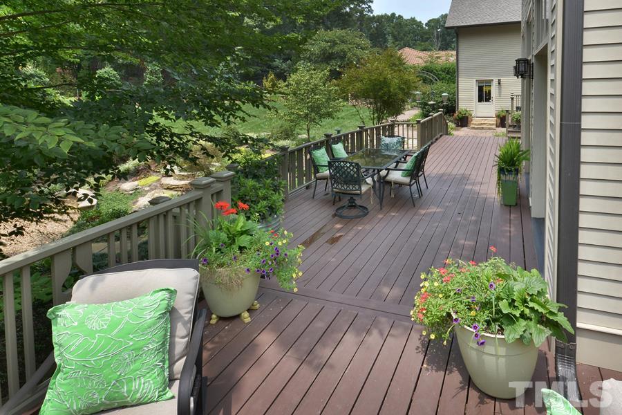 7 Springhouse Place Durham, NC 27705 - Photo 7 of 30 a view of a chairs and table on the wooden floor