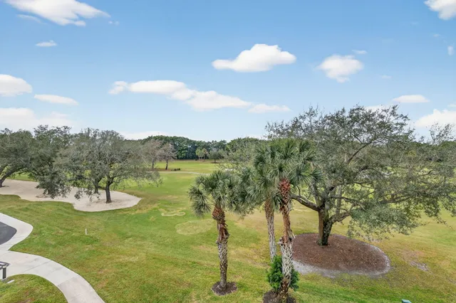 a view of a lake with a yard