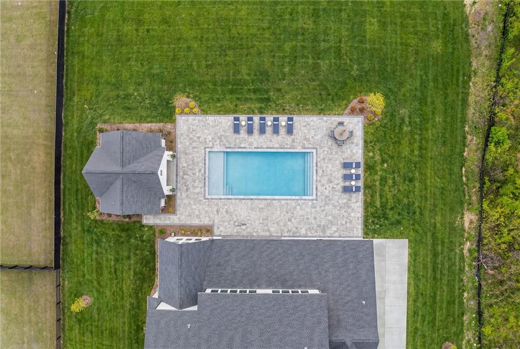 3215 Indian Shoals Road Dacula, GA 30019 - Photo 18 of 18 an aerial view of a house with a yard