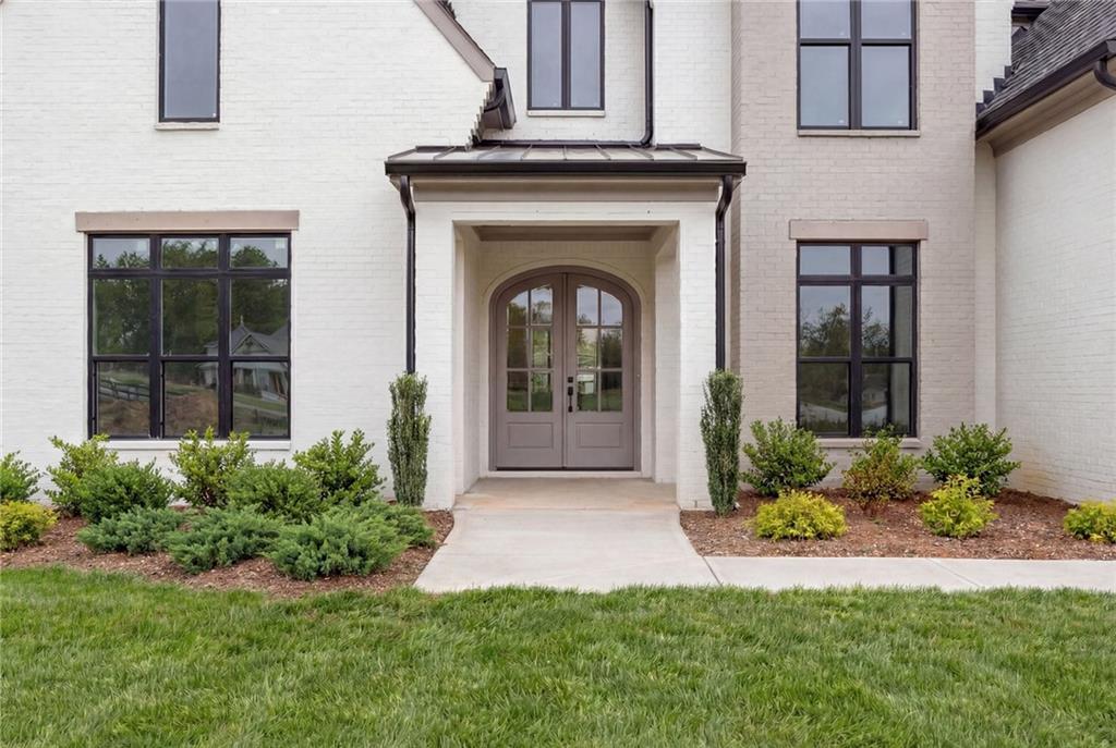 3215 Indian Shoals Road Dacula, GA 30019 - Photo 6 of 18 a view of a house with a garden