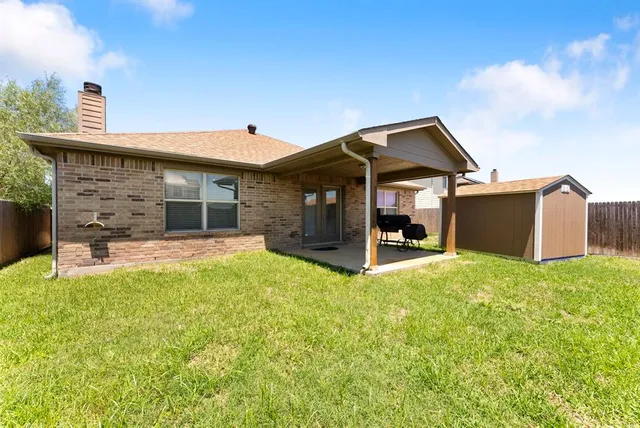 a house view with a garden space