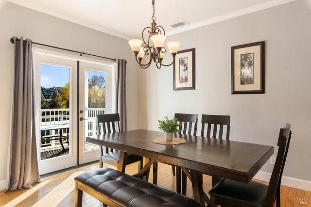 a bedroom with a flat screen tv and a bed