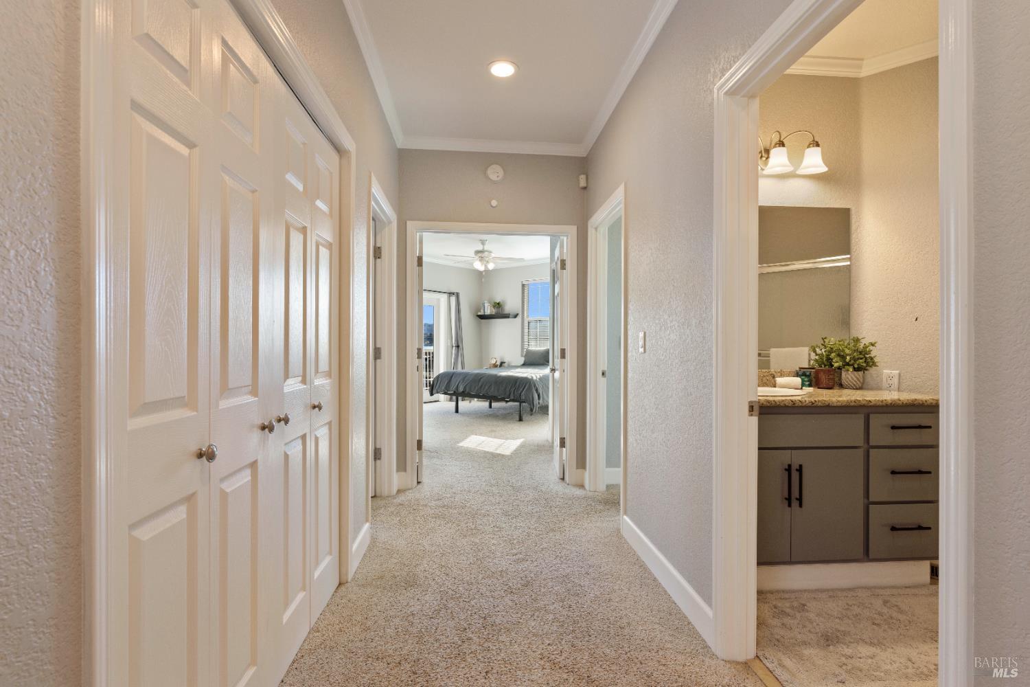 11115 Lakeshore Drive Clearlake, CA 95422 - Photo 29 of 69 a view of a hallway and a livingroom with wooden floor
