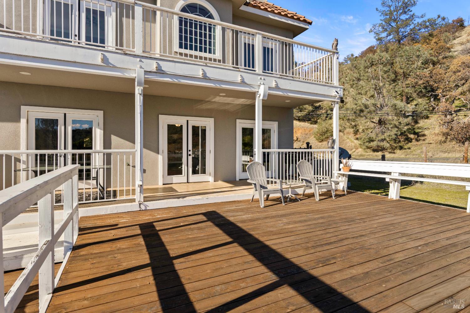 11115 Lakeshore Drive Clearlake, CA 95422 - Photo 50 of 69 a view of a rooftop deck with chairs