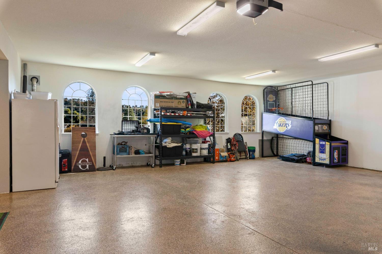 11115 Lakeshore Drive Clearlake, CA 95422 - Photo 58 of 69 a view of a livingroom with furniture and a gym machine