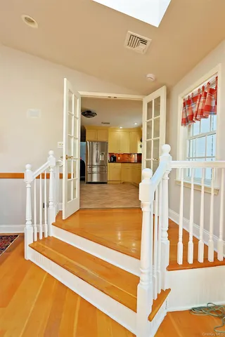 a bathroom with a sink mirror and double vanity
