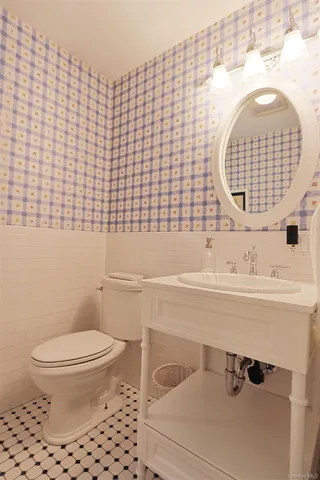 a living room with couch and a table