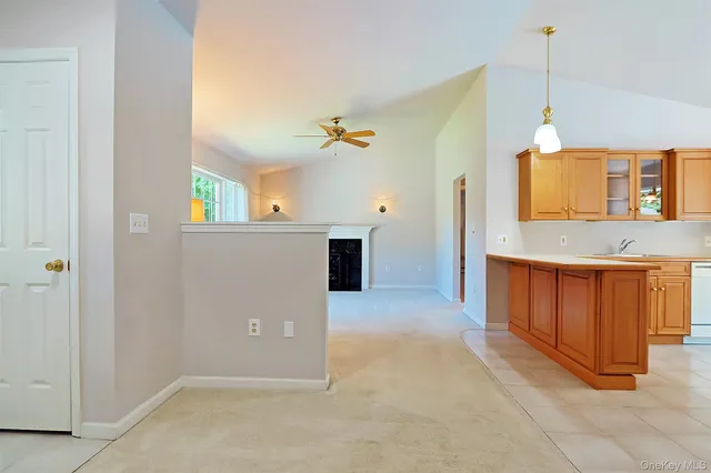 a view of a livingroom with furniture and a fireplace