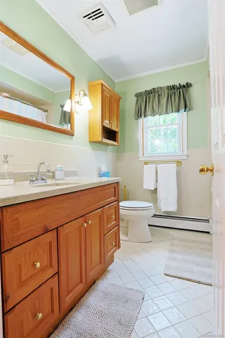 a bed room with a bed and a walk in closet