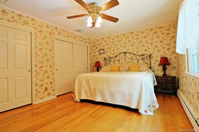 a view of front door with wooden floor