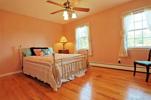 a view of a room with wooden walls