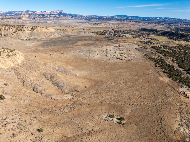 1040 West Under The Rim Road Tropic, UT 84776 - Photo 8 of 21 Expansive desert landscape featuring varied topography with distant mountain ranges