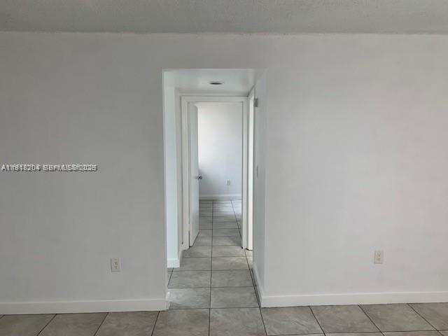 10801 Southwest 109th Court, Unit D203 Miami, FL 33176 - Photo 11 of 28 a view of a hallway