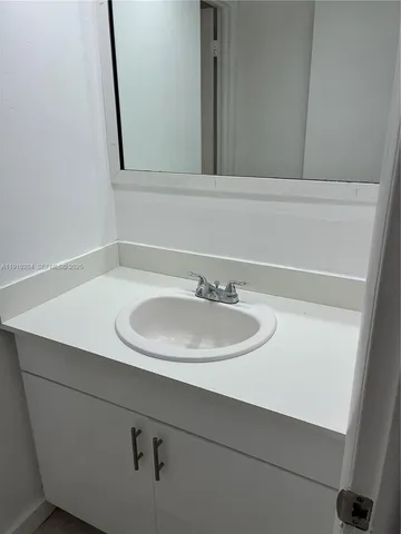 a bathroom with a shower and a toilet