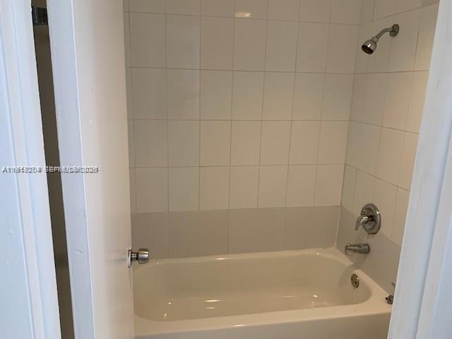 10801 Southwest 109th Court, Unit D203 Miami, FL 33176 - Photo 14 of 28 a bathroom with a bathtub
