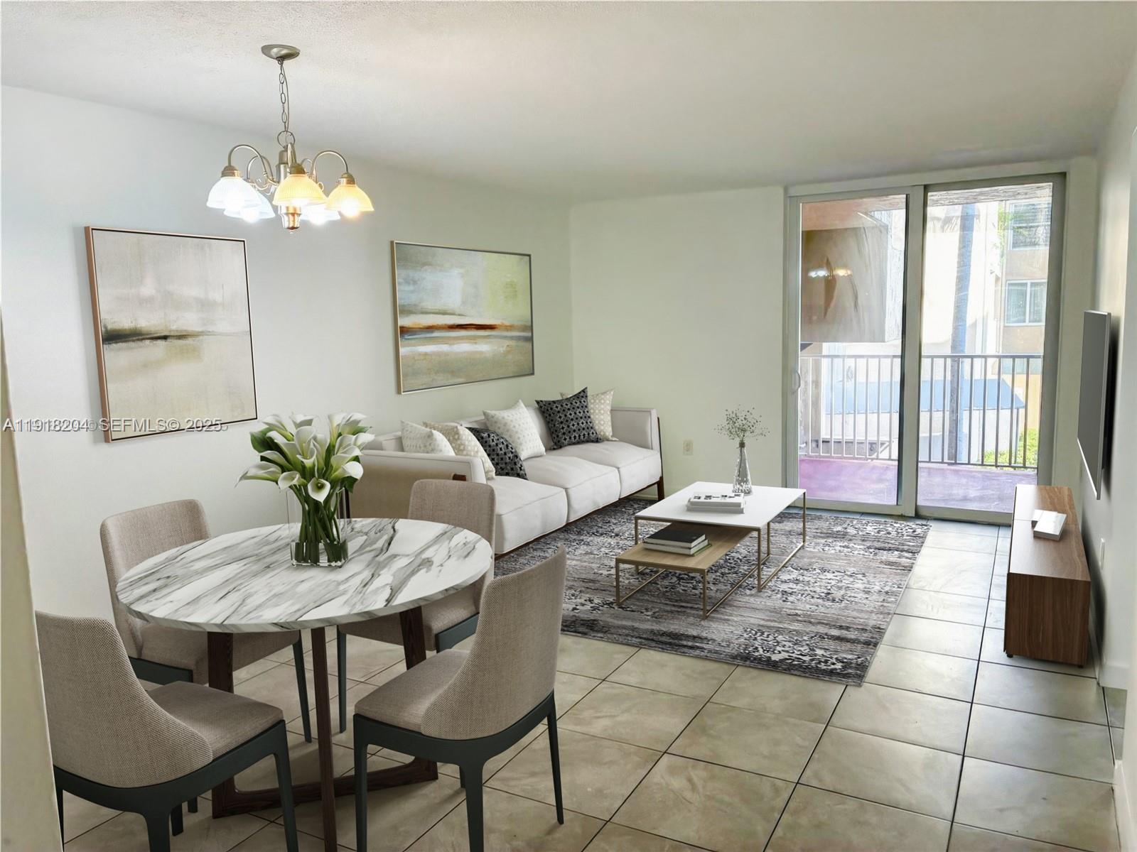 10801 Southwest 109th Court, Unit D203 Miami, FL 33176 - Photo 28 of 28 a living room with furniture a window and a chandelier