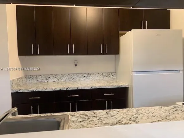 a utility room with a sink