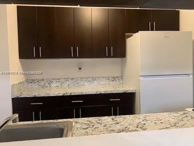 a utility room with a sink