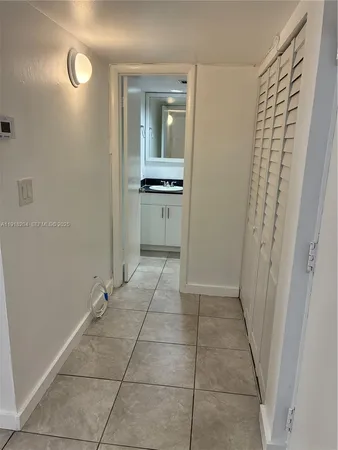 a kitchen with a refrigerator