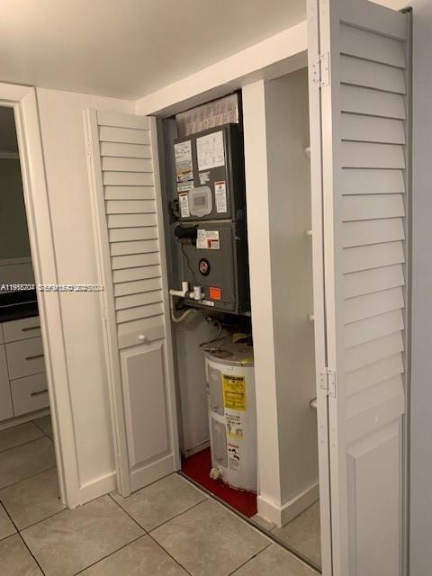 10801 Southwest 109th Court, Unit D203 Miami, FL 33176 - Photo 6 of 28 a kitchen with a refrigerator