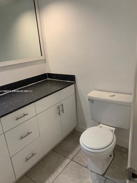10801 Southwest 109th Court, Unit D203 Miami, FL 33176 - Photo 8 of 28 a white toilet sitting next to a sink