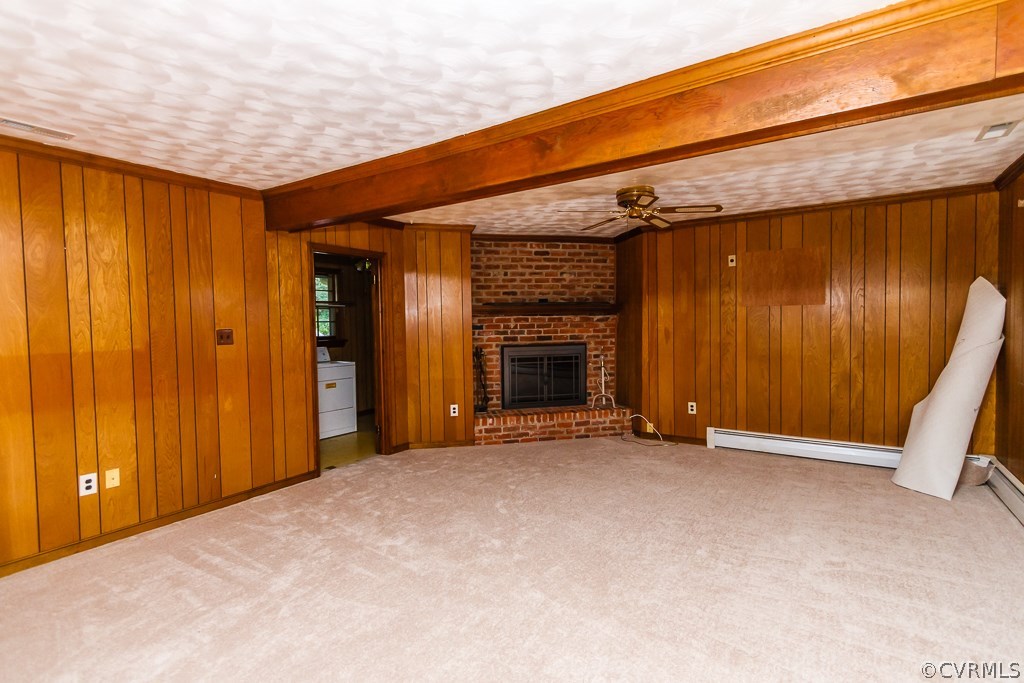 7433 River Road Hanover, VA 23069 - Photo 10 of 24 an empty room with a fireplace