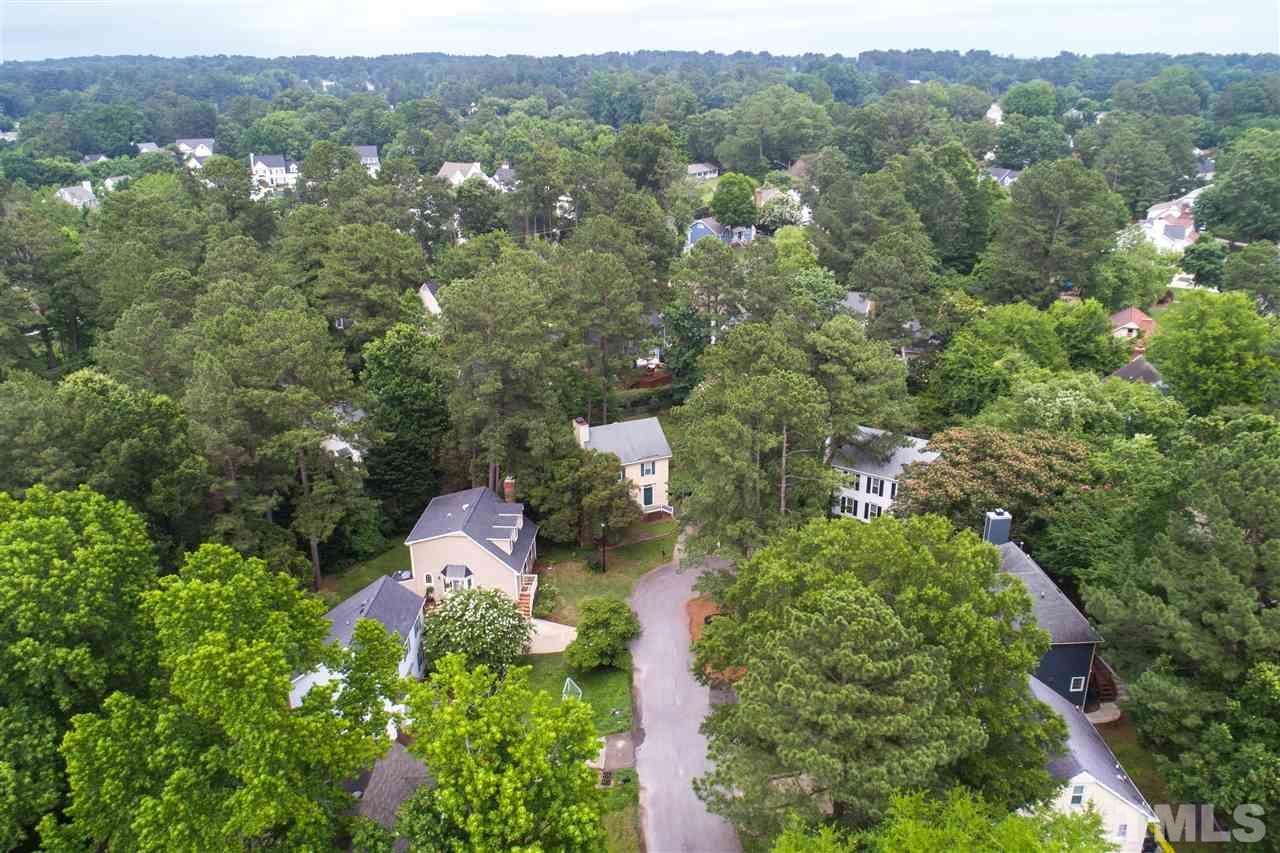 3113 East Folkestone Place Raleigh, NC 27604 - Photo 6 of 23 an aerial view of a house with yard