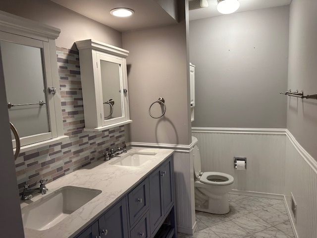 1253 West Illinois Avenue Palatine, IL 60067 - Photo 16 of 18 a bathroom with a sink toilet and shower