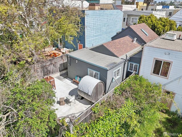 a view of a patio in backyard