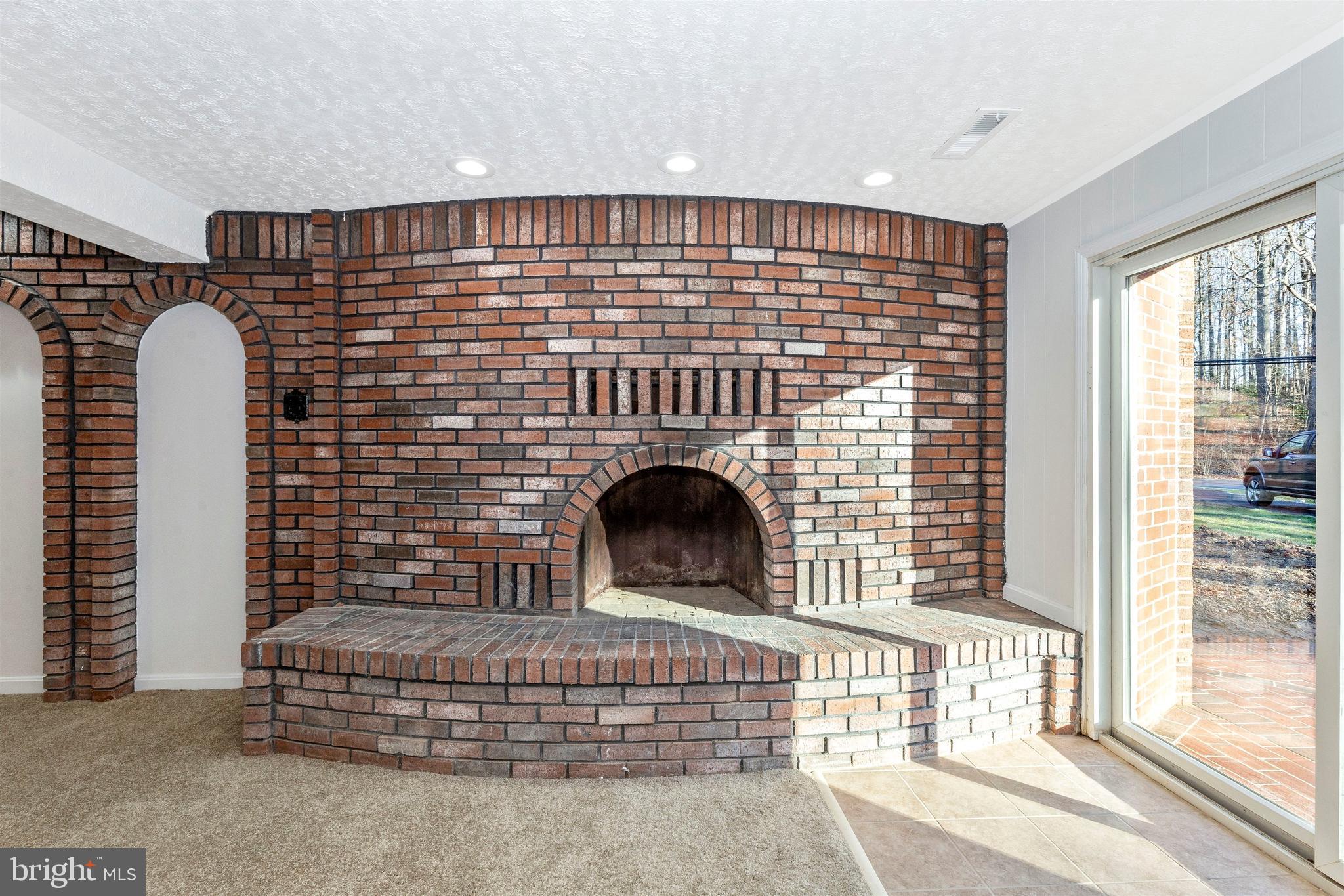 2233 Kings House Road Silver Spring, MD 20905 - Photo 27 of 36 Fireplace in Lower Level
