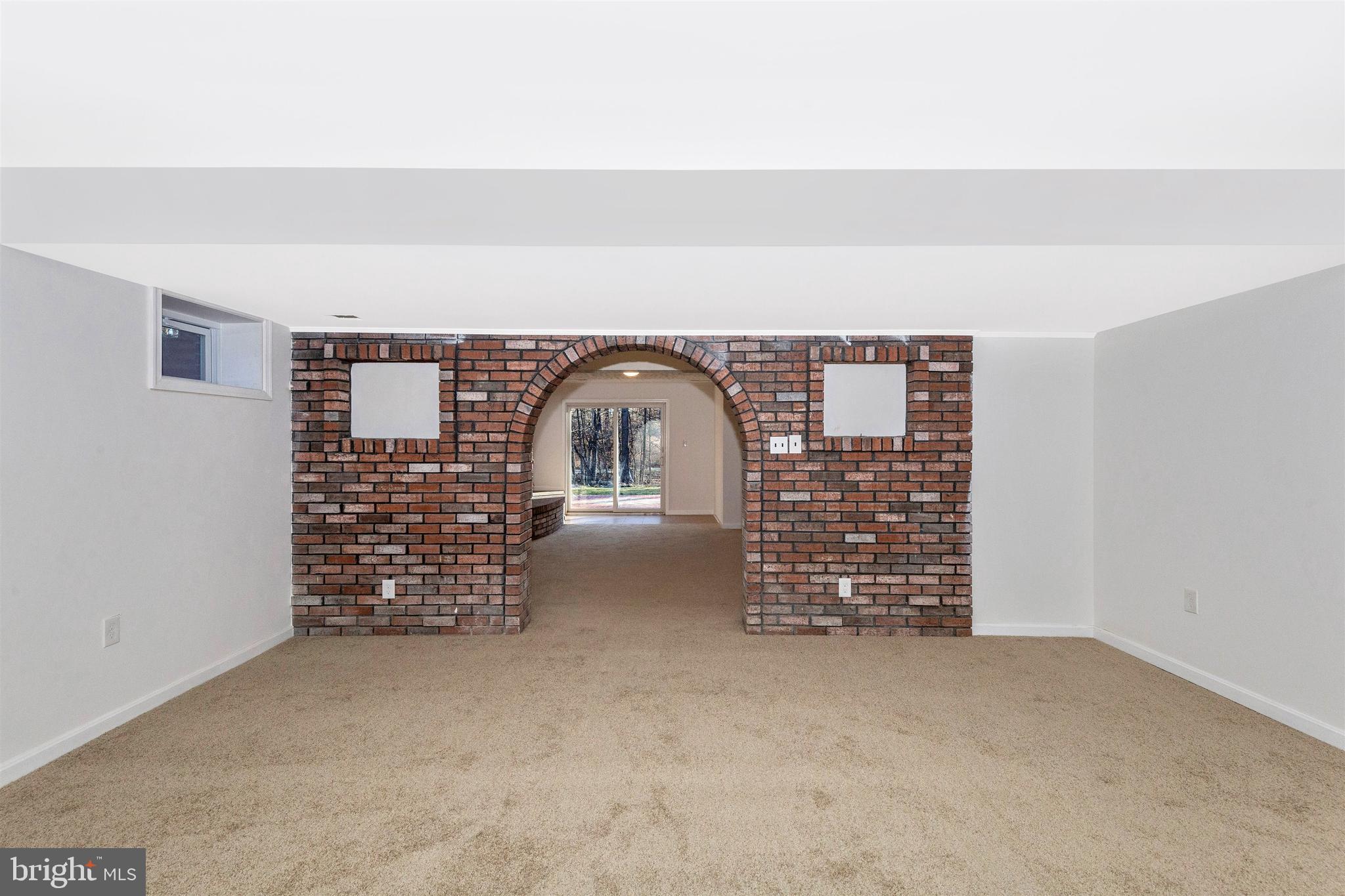 2233 Kings House Road Silver Spring, MD 20905 - Photo 29 of 36 Lower Level view of brick archway to outside