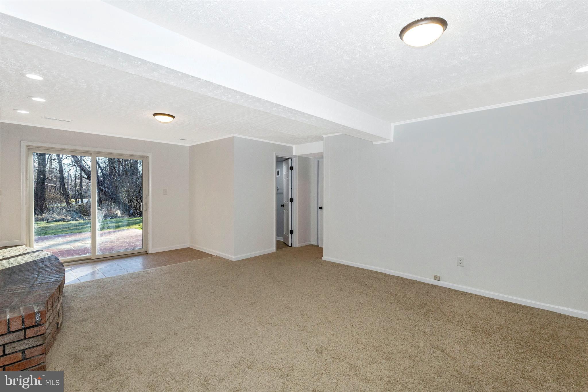 2233 Kings House Road Silver Spring, MD 20905 - Photo 30 of 36 Lower Level view to outside of property
