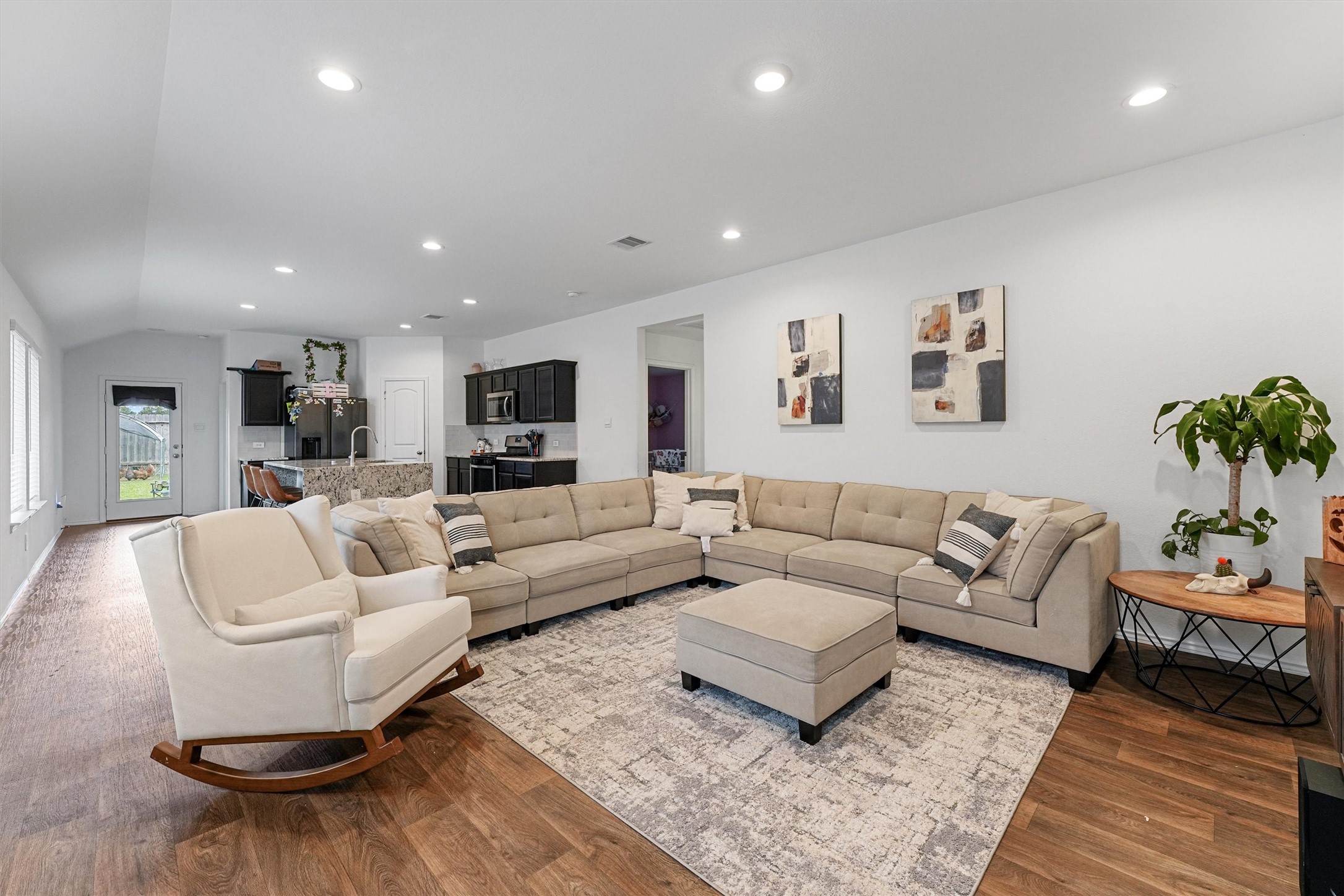 22411 Gilded Peak Lane Spring, TX 77373 - Photo 5 of 16 a living room with furniture and a couch