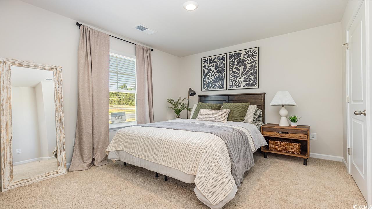 1019 St Martin Street Georgetown, SC 29440 - Photo 21 of 33 Bedroom with light carpet and recessed lighting