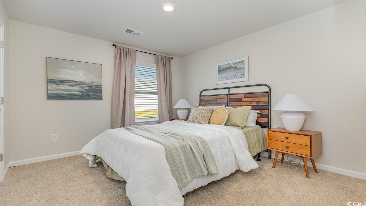 1019 St Martin Street Georgetown, SC 29440 - Photo 23 of 33 Bedroom with light colored carpet and recessed lighting