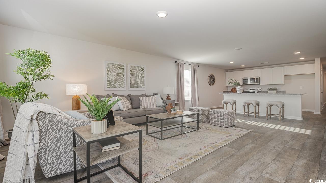 1019 St Martin Street Georgetown, SC 29440 - Photo 6 of 33 Living room with recessed lighting and light wood-style flooring