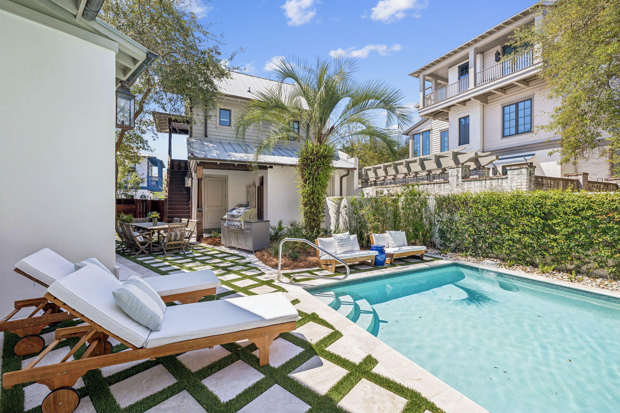 216 Round Road Rosemary Beach, FL 32461 - Photo 4 of 58 a view of a chairs and table in a patio