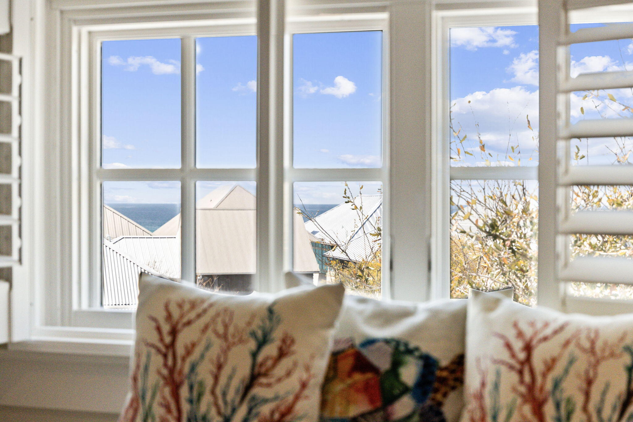 216 Round Road Rosemary Beach, FL 32461 - Photo 42 of 58 a bed sitting in front of a window next to a window