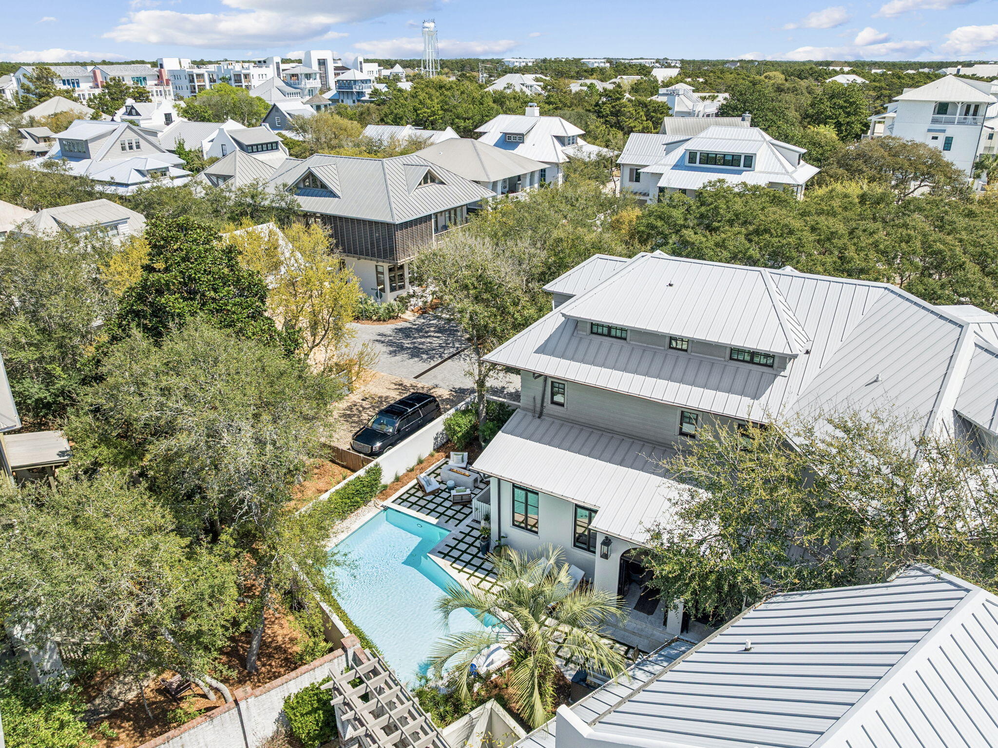 216 Round Road Rosemary Beach, FL 32461 - Photo 56 of 58 an aerial view of a house with a garden