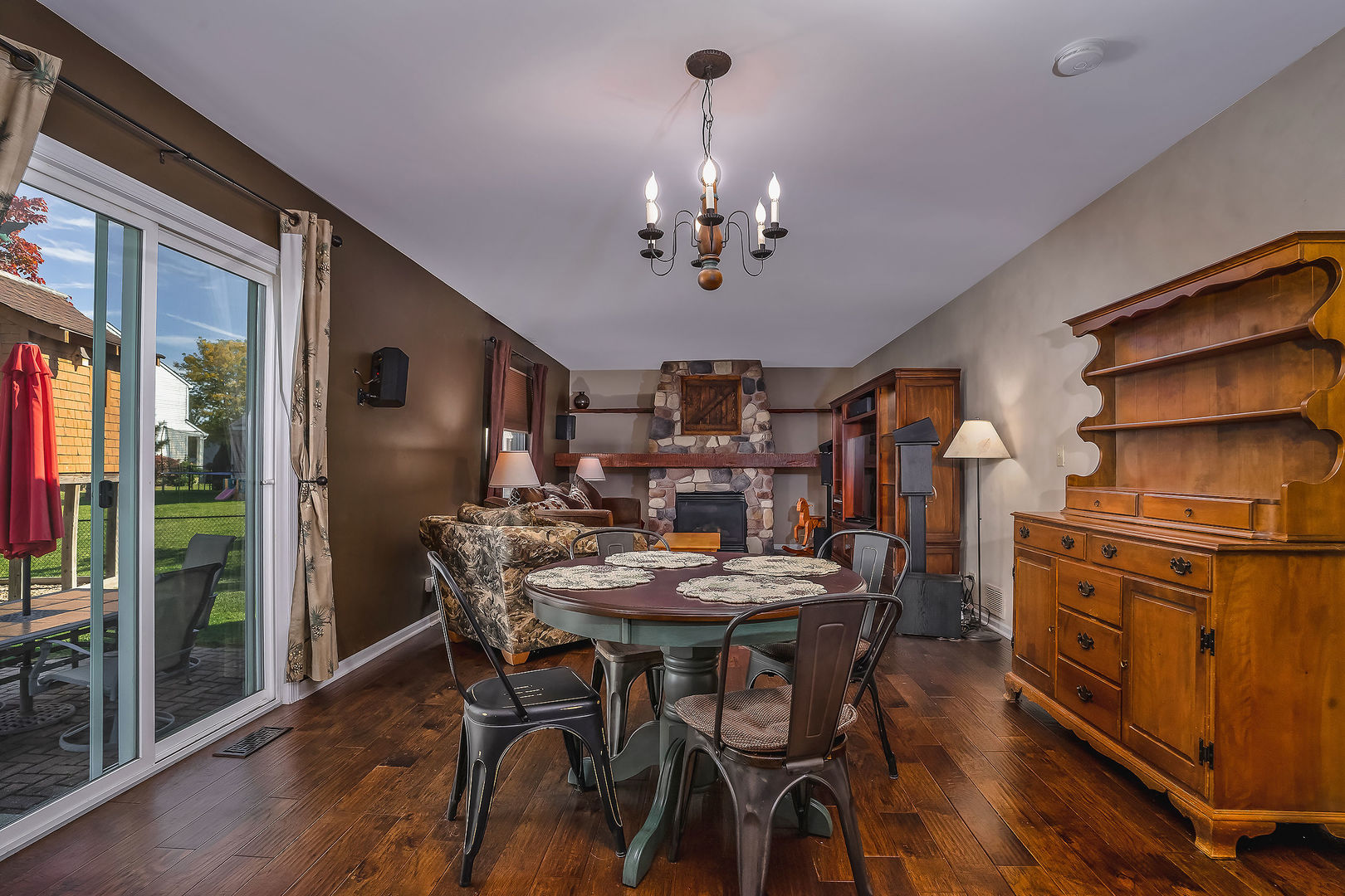 1394 Ridge Road South Elgin, IL 60177 - Photo 4 of 22 a view of a dining room with furniture window and wooden floor