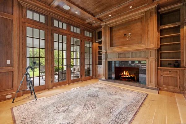 a view of a livingroom with a fireplace and a fireplace