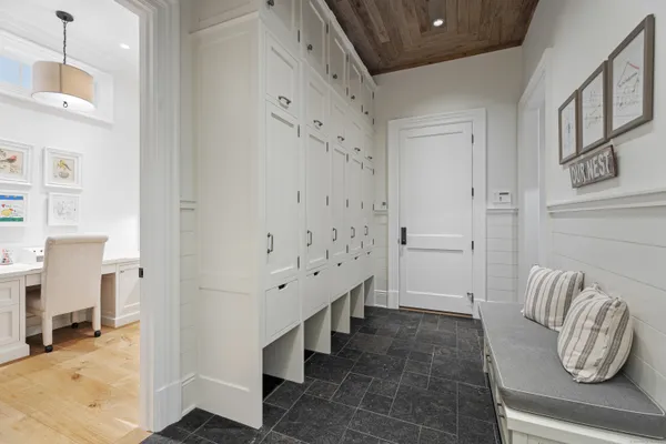 a bathroom with a tub and shower