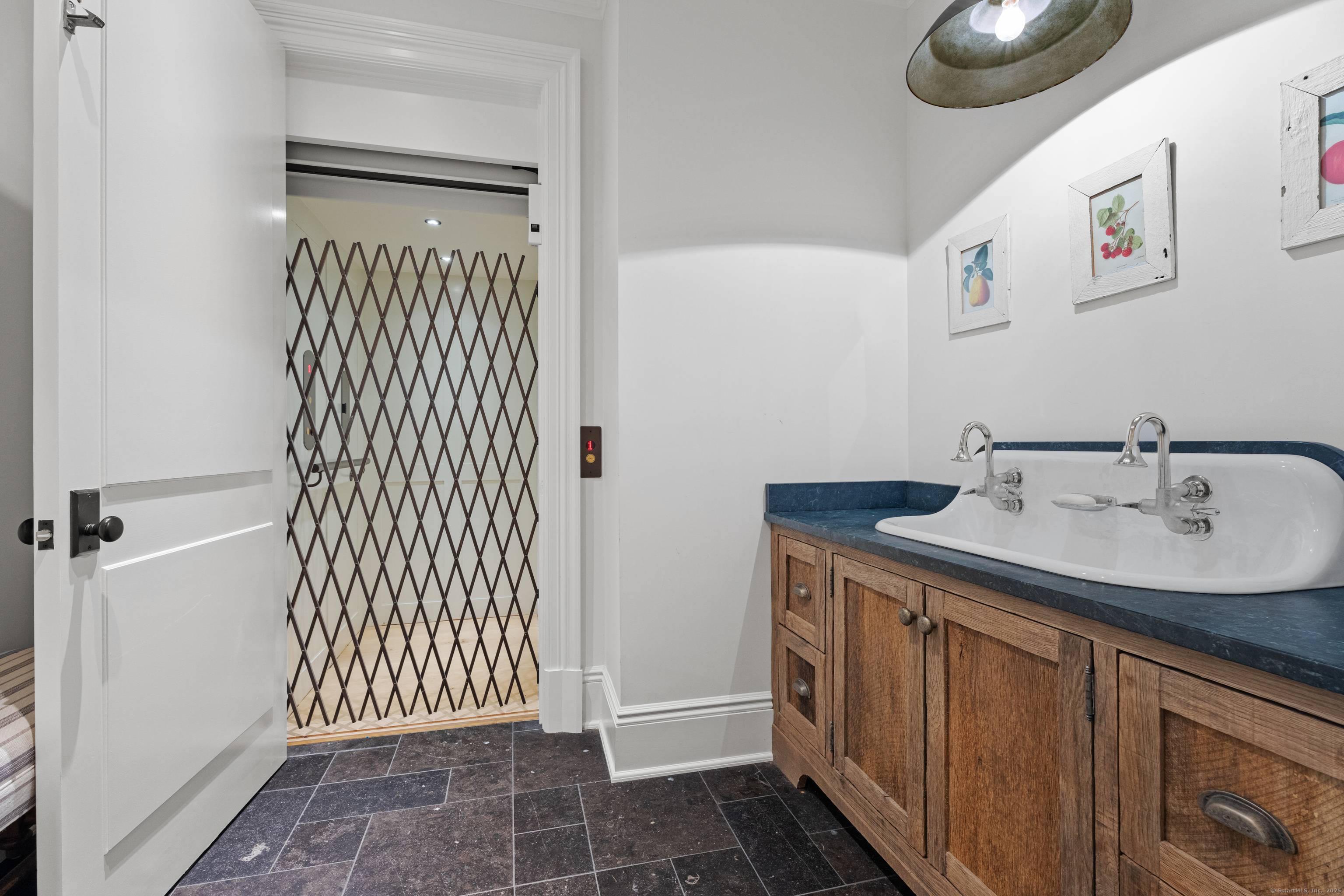 294 Maple Road Easton, CT 06612 - Photo 20 of 40 a bathroom with a sink and a mirror