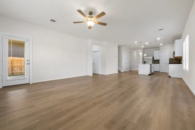 a view of a kitchen with a dishwasher and a cabinets